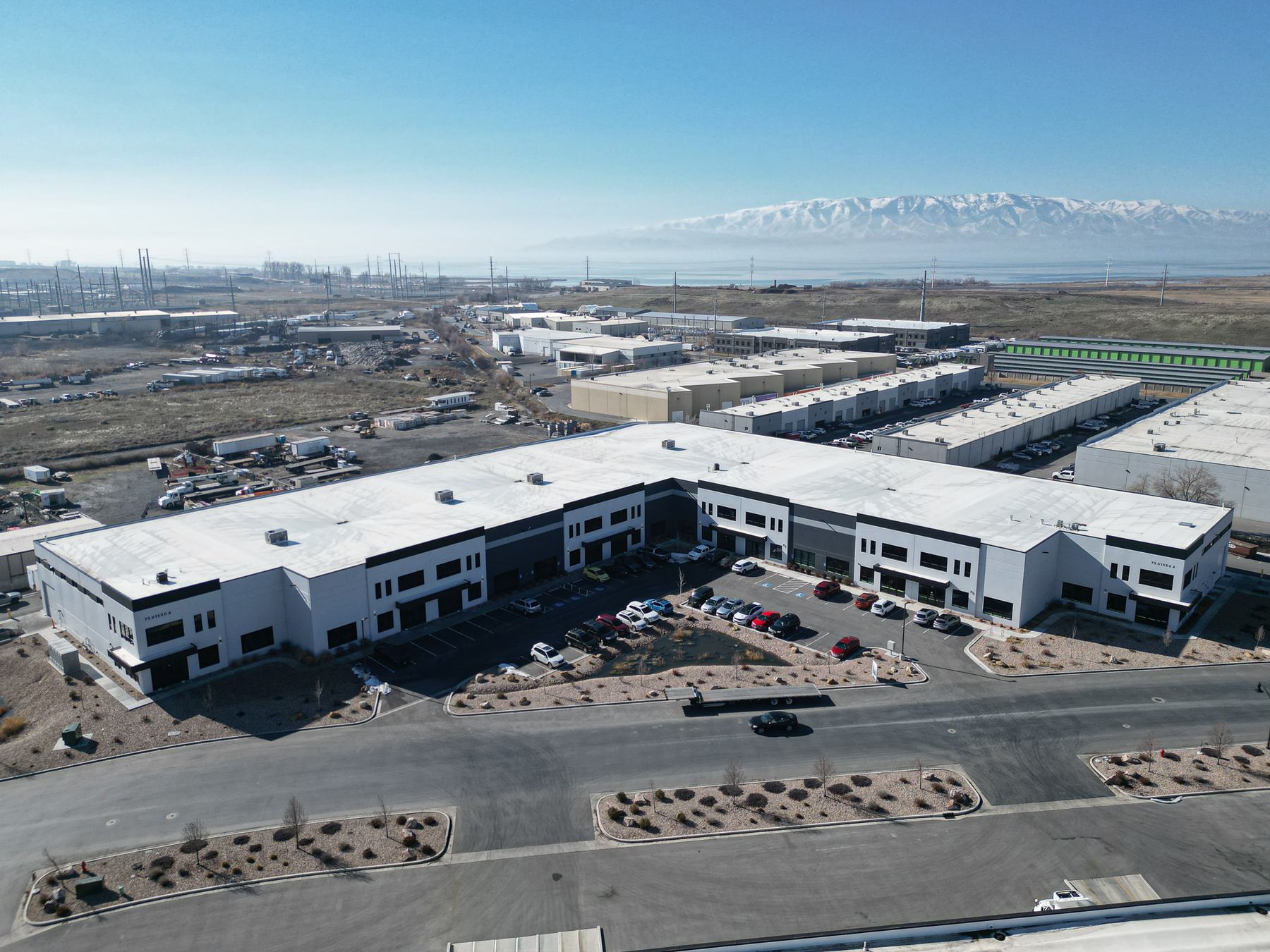 Flex industrial building around a central parking lot